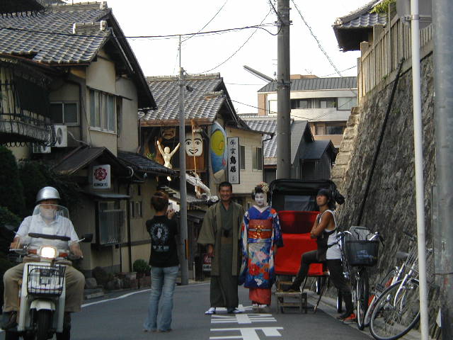 woman dressed as a geisha