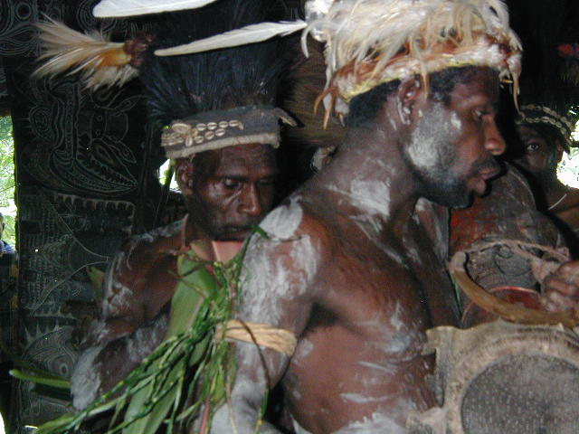 men with crocodile scars at Kraimbit